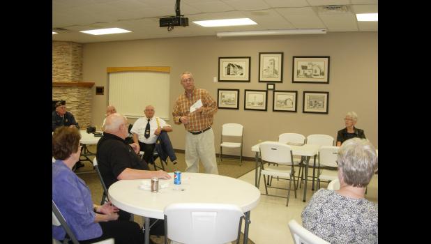 Jason Passmore accepted a grant for the Welcome Center.