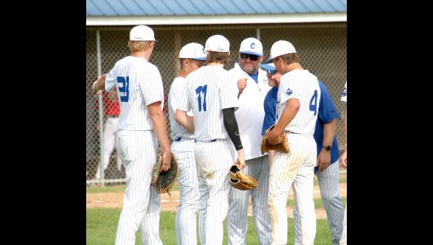 The Crestwood baseball team discusses the game plan during a recent contest.