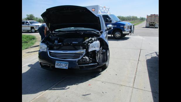Two individuals were hurt in this truck-van accident.