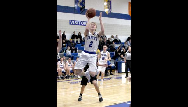 Carter Henry drives to the basket during a recent home contest.
