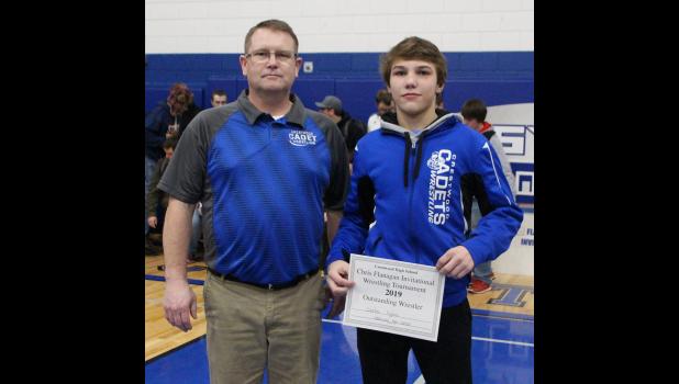 Crestwood freshman Carter Fousek, right, was named Outstanding Wrestler at the Flanagan Tournament on Jan. 5. Also pictured is Crestwood Head Coach Keith Slifka.