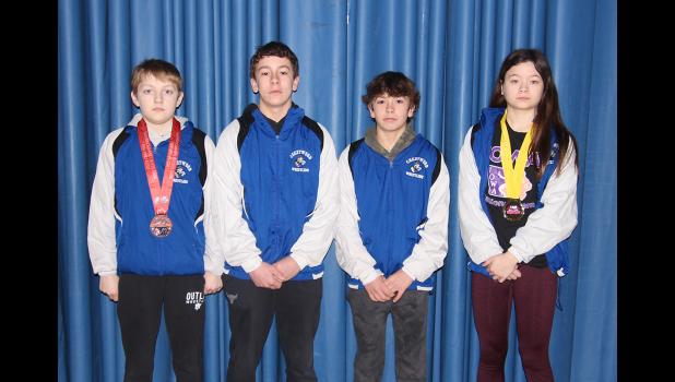 Crestwood Junior High wrestlers who competed at the State AAU Tournament included, from left to right: Mitchell Williams (fifth), Ethan Bergan, Noah Bergan and Isla Schemmel (first).