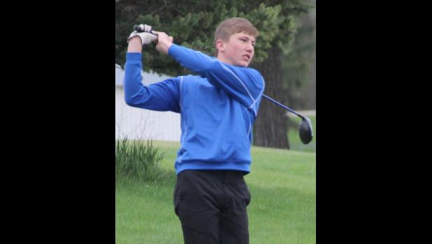 Justin Reinking rips a tee shot at home against Waukon on April 24.