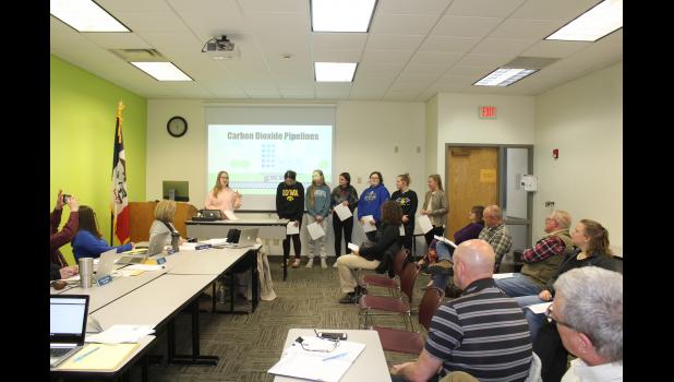 The FFA Ag Issues team practiced their presentation at the March 21 Howard-Winneshiek School Board meeting. Those going to state are from left, Kelsey Burke, Taryn Grube, Marissa Bronner, Emily Church, Nora Ryan, Kayla Burke and Ashley Reicks.
