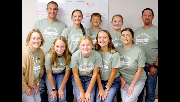 Howard County Youth Horse participants and volunteers pose for a photo at the TPD office before heading out to raise funds towards the project. Front L-R: Liz Baethke, Caroline Friedges, Alli Burns, Emma Burns, and Amber Vrieze. Back L-R: Jay Burns, Claire Kach, James Kach, Cora Kach and Allen Stoddard.