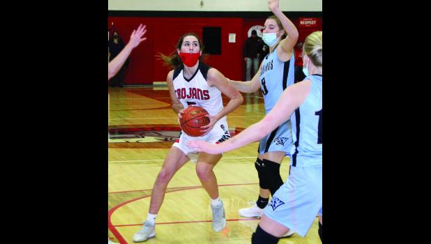 TV senior Ali Hoffert set the Trojan girls' basketball all-time scoring mark during the Feb. 9 game against Clayton Ridge.