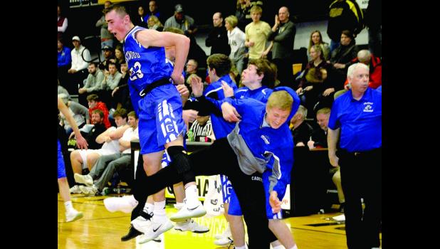 Clayton Ollendieck and Carter Henry celebrate the win over Clear Lake.