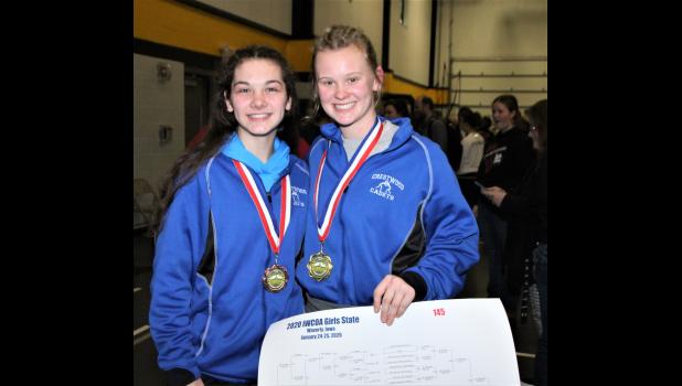 Lexi Hoppe, left, placed eighth at the State Wrestling Tournament while Laken Lienhard, right, finished first.