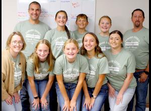 Howard County Youth Horse participants and volunteers pose for a photo at the TPD office before heading out to raise funds towards the project. Front L-R: Liz Baethke, Caroline Friedges, Alli Burns, Emma Burns, and Amber Vrieze. Back L-R: Jay Burns, Claire Kach, James Kach, Cora Kach and Allen Stoddard.